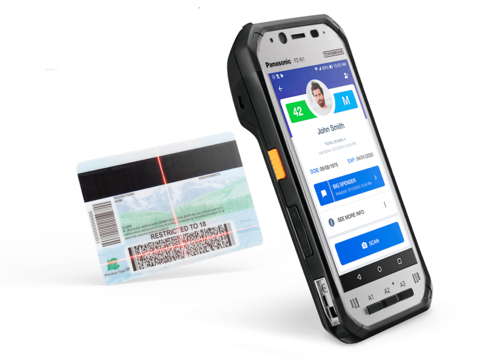 Panasonic N1 handheld ID scanner scanning the back of a drivers license